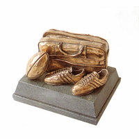 A rugby trophy in Float Bronze. Beautifully detailed rugby ball, boots and kit bag. Mounted on Lakeland slate, it has a good weight to it, and makes a great  award.