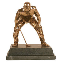 This striking bronze figure shows a golfer lining up his putt for a great shot. An original, hand-crafted piece, it is the perfect portrait of a golfer getting ready for success.