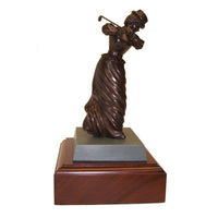 This real bronze Victorian lady golfer is a charming piece with superb finishing and great details. The traditional dark patinated finish adds to its nostalgic interest. Right down to the full-length skirt in the fashions of the time, this original, hand-crafted piece captures those bygone days beautifully. From the ribboned boater, to the hairstyling, the elegant face, and the flowing skirt and pointy shoes, the detail is immense. 