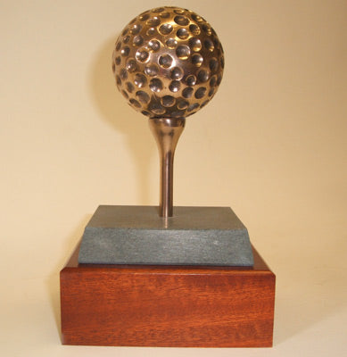 This over-sized golf ball is the middle-sized of the three golf ball trophies available at Thomas & Peters. These three bronze balls are ideal as a three-prize package, but are equally suitable as individual trophies or gifts for a range of purposes. This piece has a very striking presence on a prize table individually